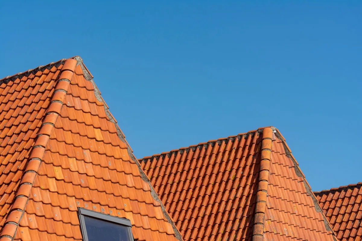 Clay barrel tile rooflines on homes in Gulfport, MS